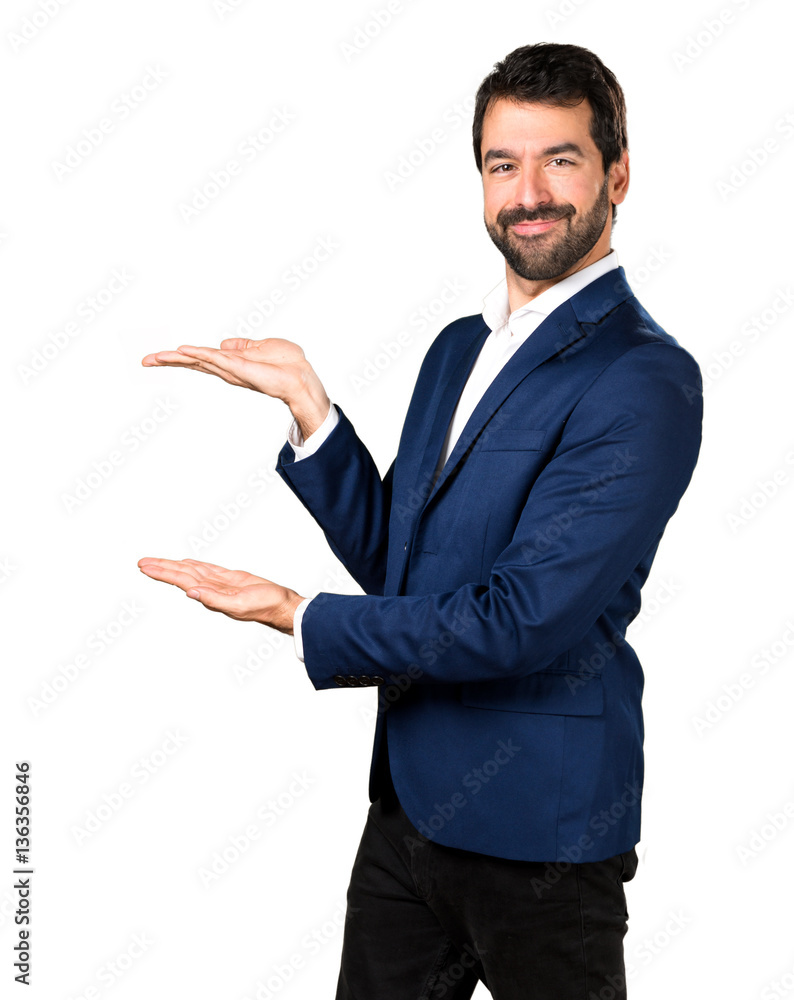Handsome man presenting something Handsome man presenting something