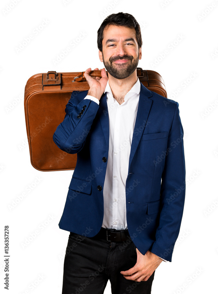 Fototapeta premium Handsome man holding a briefcase