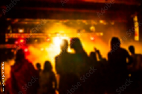 Couple in love at the concert. Defocus