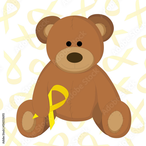 children's toy bear holding a yellow ribbon as a symbol of childhood cancer awareness