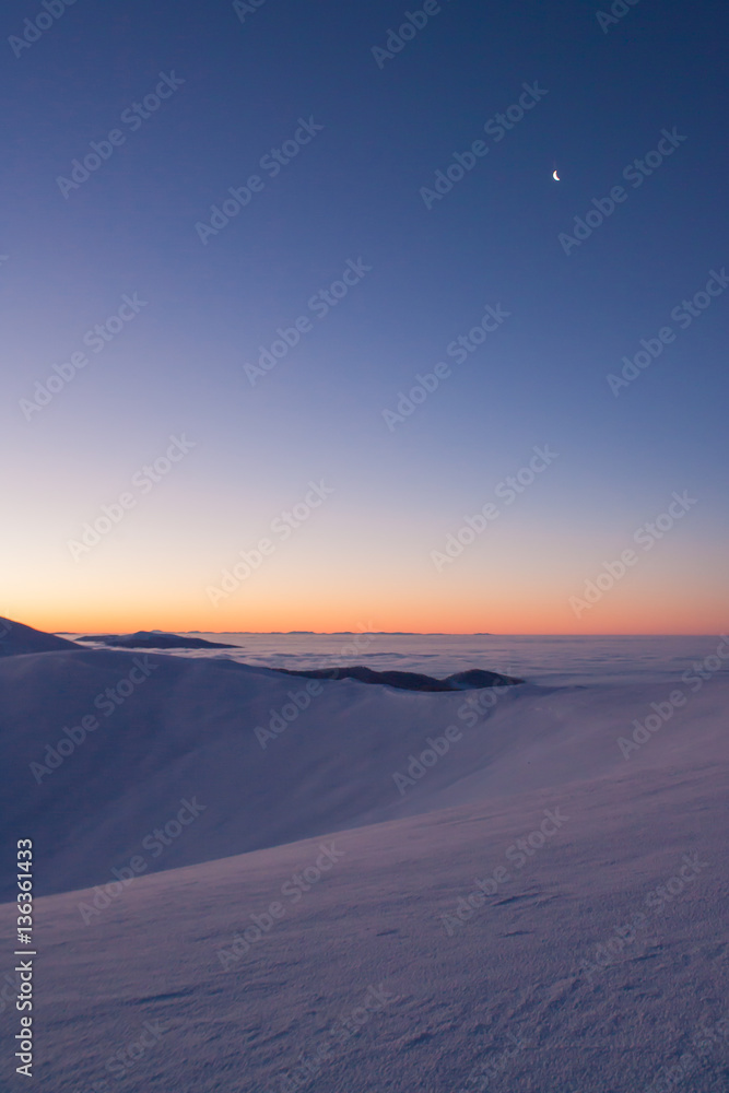 colorful winter minutes before sunrise in the Carpathian mountains