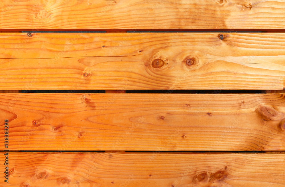 Background of orange oiled wooden planks Background of orange oiled wooden planks