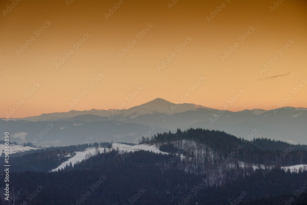 sunset winter mountain Carpathians, Bukovel, Ukraine
