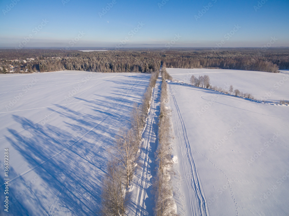 winter road intersection in the countryside with a bird's-eye view