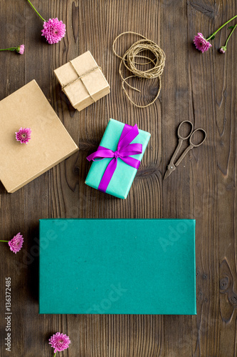 wrapping gifts in box for holiday top view mock up