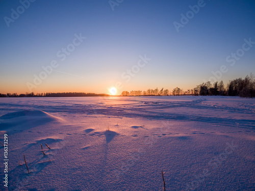 snowy winter field with a bird s-eye view