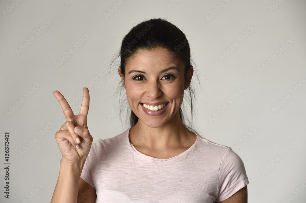 portrait of young beautiful and happy Latin woman with big toothy smile excited and cheerful portrait of young beautiful and happy Latin woman with big toothy smile excited and cheerful