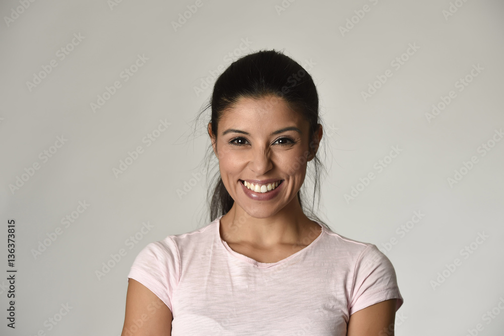 portrait of young beautiful and happy Latin woman with big toothy smile excited and cheerful portrait of young beautiful and happy Latin woman with big toothy smile excited and cheerful