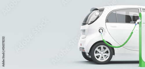 Automobile elettrica ecologica o ibrida in carica photo