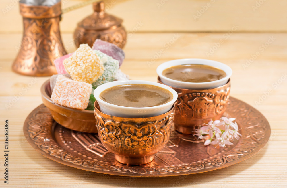 Fototapeta premium Coffee and Turkish delight in a copper cups