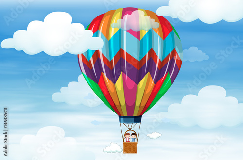 Kids riding on big balloon