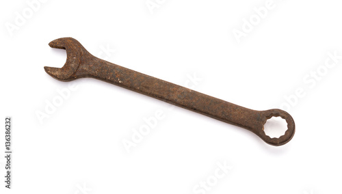 rusty spanner on a white background