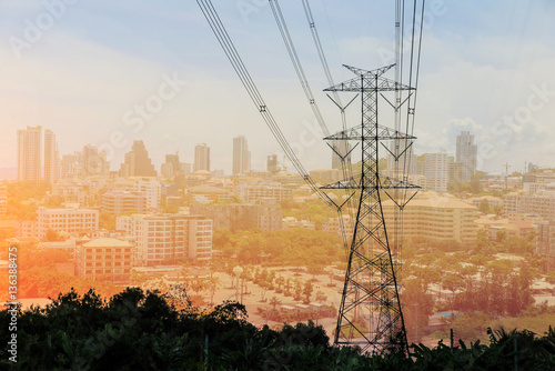 Wallpaper Mural Electricity tower and electric line, power line and city building, double exposure Torontodigital.ca