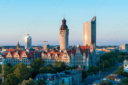 skyline of Leipzig with townhall and high court at sunset, Germany