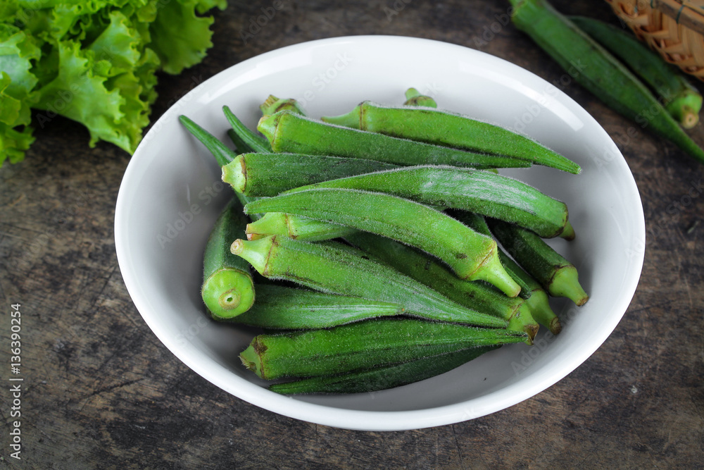fresh whole and slice organic green okra, healthy vegetable fresh whole and slice organic green okra, healthy vegetable