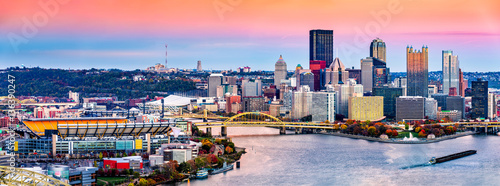 Pittsburgh, Pennsylvania skyline at sunset and the famous baseball stadium across Allegheny river
