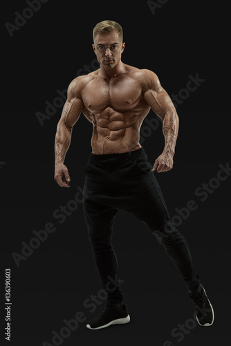 Shirtless male model posing muscular core
