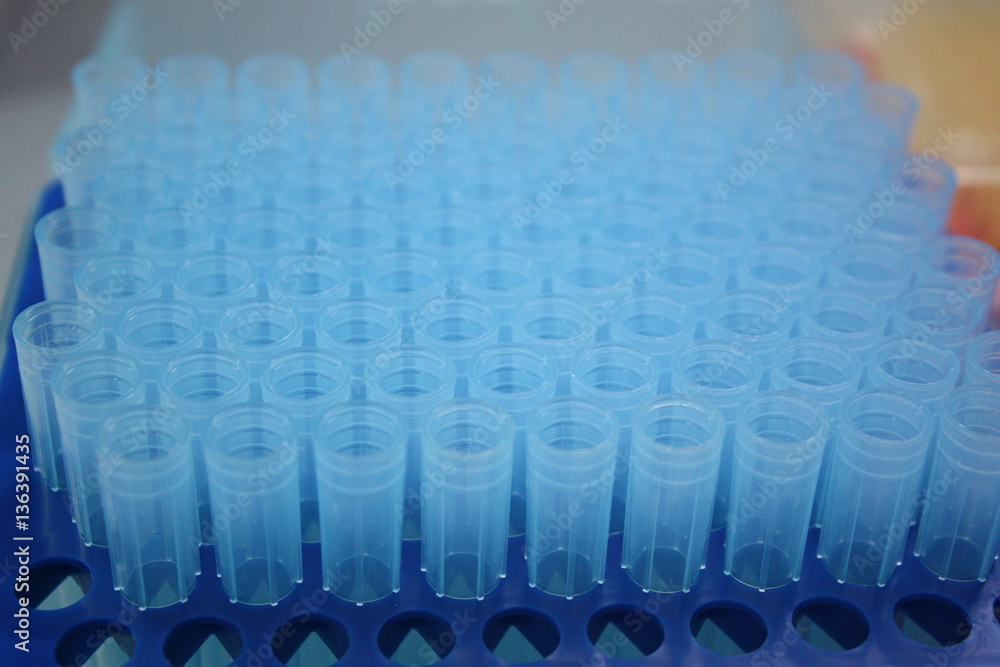 Blue tubes pack in a laboratory setting closeup Blue tubes pack in a laboratory setting closeup