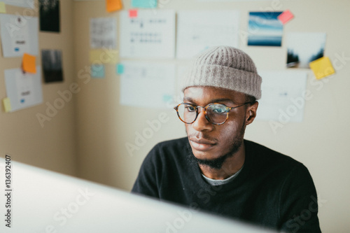 African American Man Working On His Computer