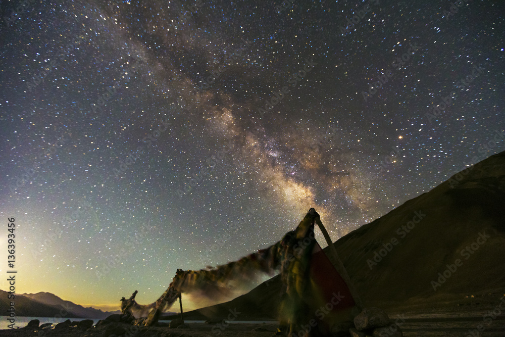 Naklejka premium The Milky Way rises over pangong lake leh ladakh in Leh India ,Long exposure photograph.