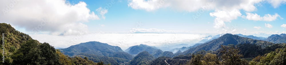 panoramic view of mountain view landscape and sea of mist with blue sky