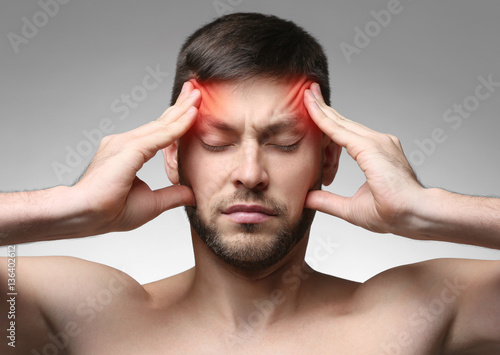 Young man suffering from he...