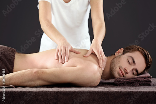Man having massage in spa s...