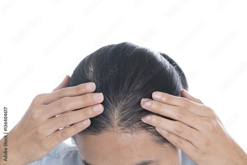 Fototapeta premium Young woman shows her gray hair roots