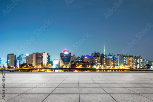 cityscape and skyline of seoul at night from empty floor