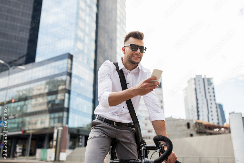 man with bicycle and smartphone on city street man with bicycle and smartphone on city street