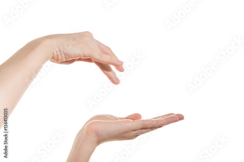 Female hand holding a virtual bank, and the other hand down your finger in it.