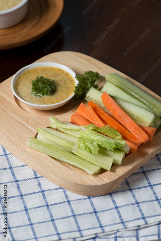 Vegetable sticks. Fresh celery and carrot, cucumber with sauce.. Vegetable sticks. Fresh celery and carrot, cucumber with sauce..