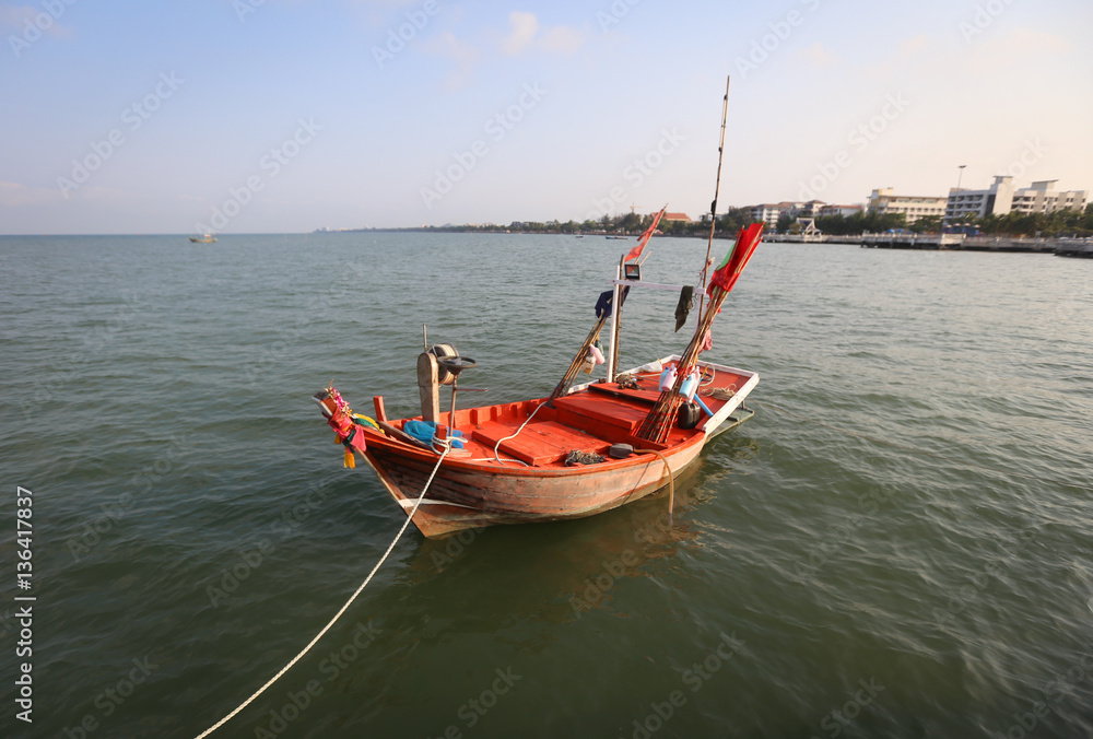 Fishing boat floating on the water, sea and sky Fishing boat floating on the water, sea and sky
