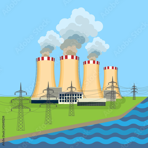 Working nuclear power plant near tower set along flowing river