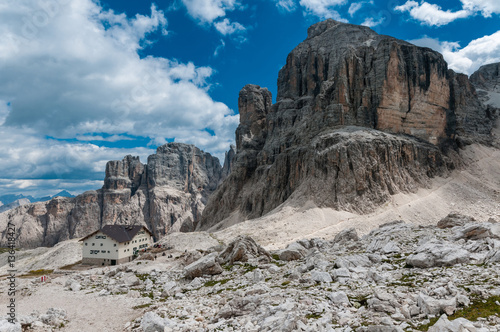 Quadro su tela Scenic view of Dolomites mountains with dramatic clouds.
