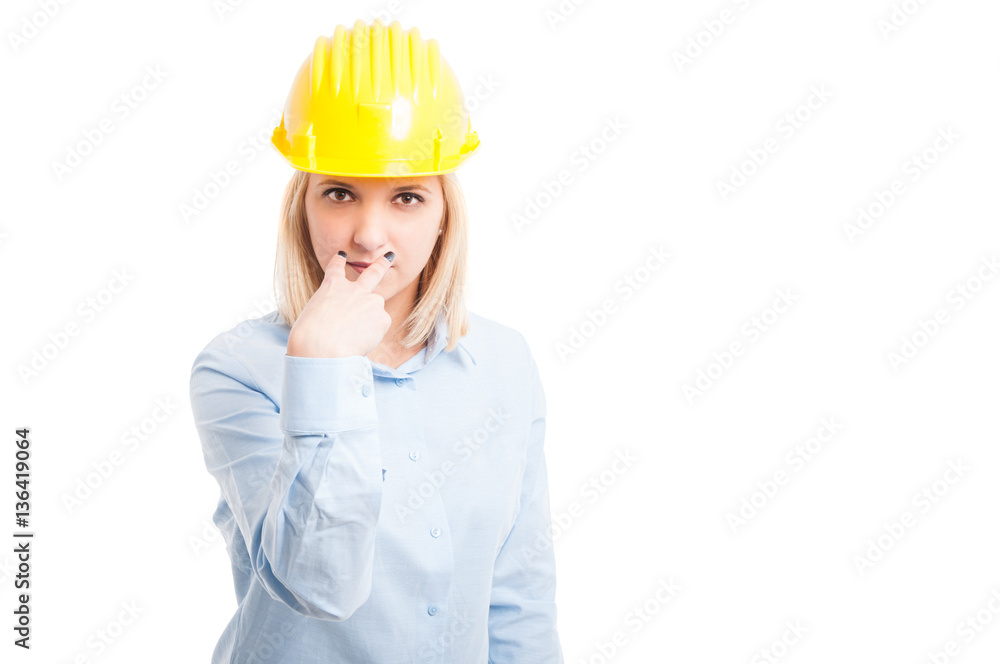 Woman architect making look into my eyes gesture Woman architect making look into my eyes gesture