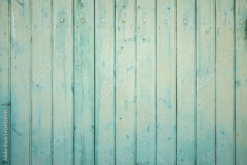 Outside wall of turquoise wooden planks