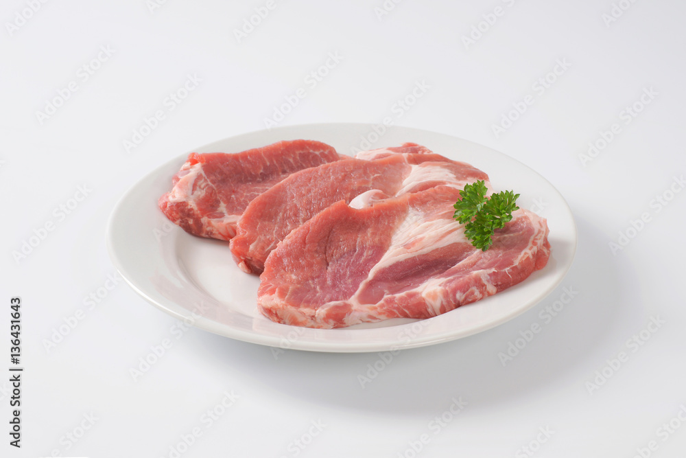 raw pork neck steaks