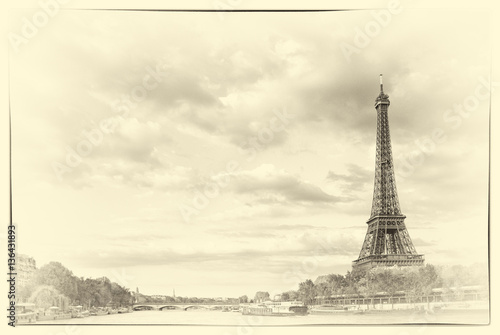Vintage The Eiffel Tower and the river Seine at sunset sky background in Paris