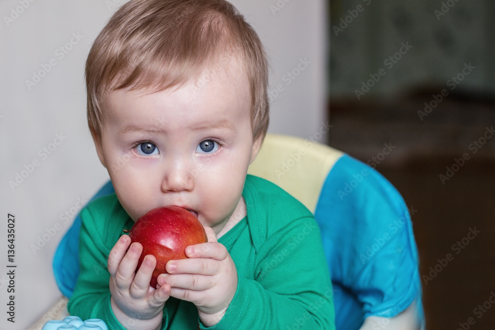baby eats red apple baby eats red apple