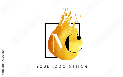 MC Gold Letter Logo Painted Brush Texture Strokes.