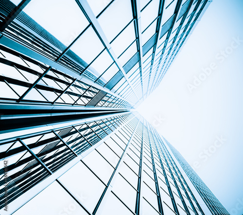 Blue skyscraper facade. office buildings. modern glass silhouet