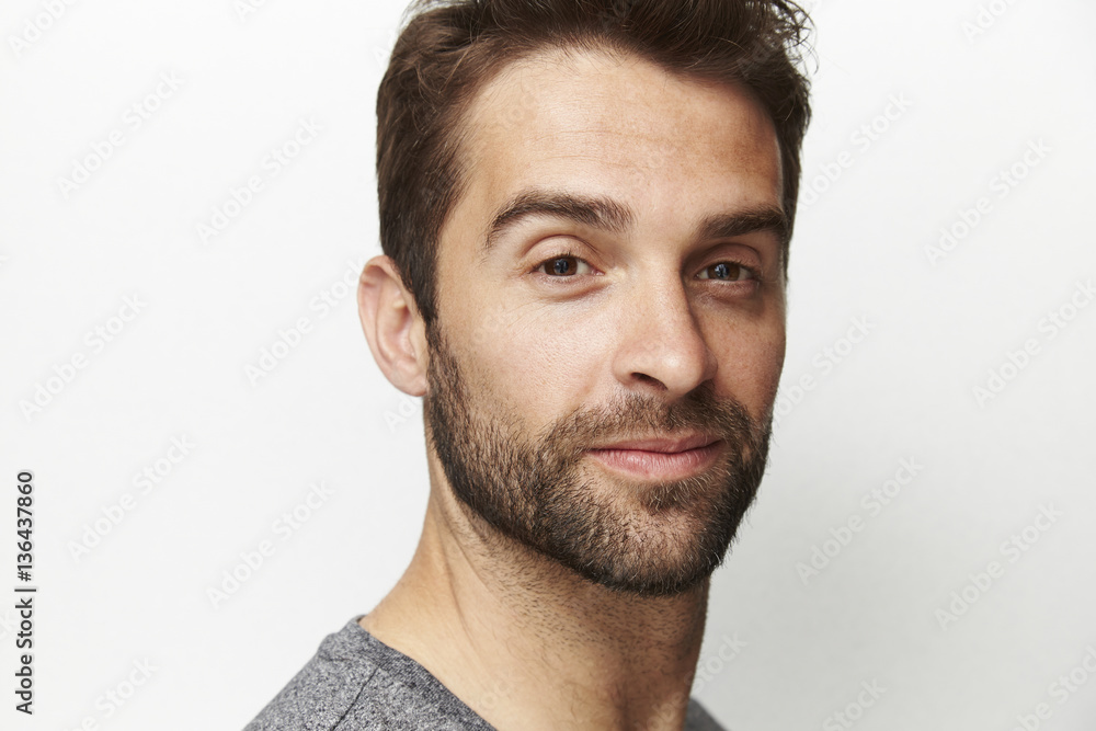 Man in portrait against white background Man in portrait against white background