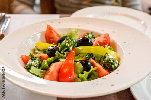Fresh Greek salad closeup in a restaurant