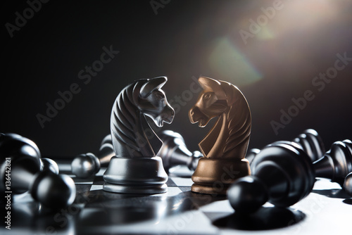 Fotografie Chess battle defeat pawn of silver team.