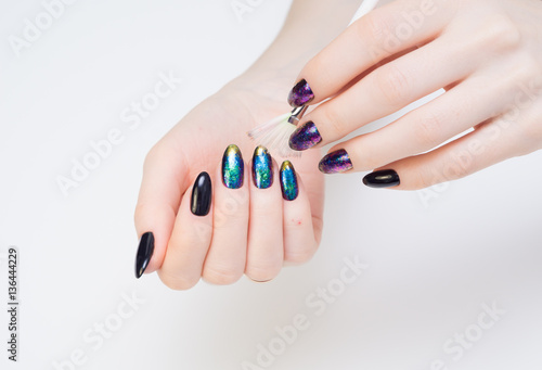 Hands and natural nails, ideal clean manicure. Decorated with stylish elements
