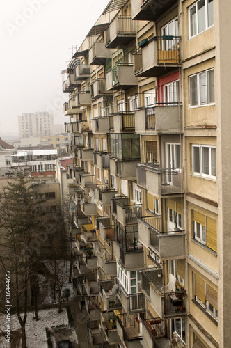 Look at the old eight-floor building during the beautiful winter day in Novi Sad, Serbia