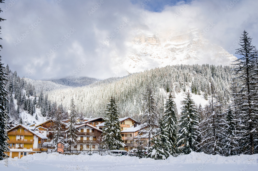 Alpine Village at the Foot of a Mountain in Winter Alpine Village at the Foot of a Mountain in Winter