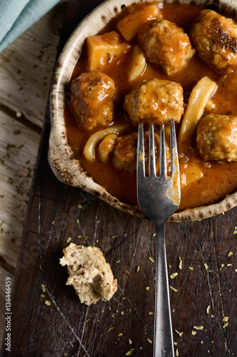 spanish albondigas con sepia, meatballs with cuttlefish photo