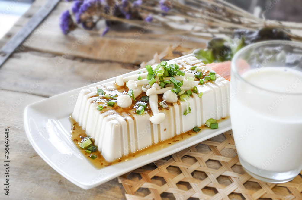 tofu with milk on the wooden table tofu with milk on the wooden table
